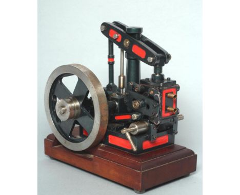 A model beam engine with unusual rocking valve twin arrangement, made without the use of castings from steel fabrications, fi