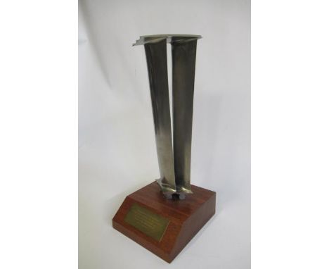 Two turbine blades from a Rolls Royce gas turbine engine mounted on wooden base with retirement inscription, E (Est. plus 21%