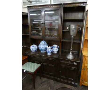 A dark oak Ercol style, two door, glazed bookcase standing on a cupboard base, 3' wide, An Ercol style oak open bookcase with