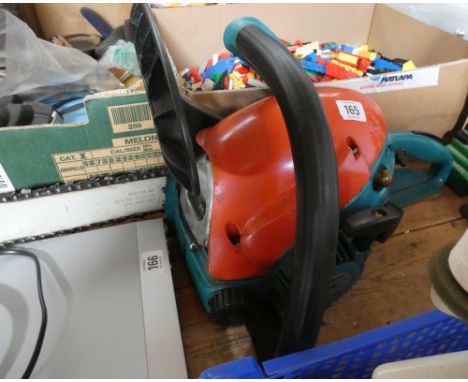 A petrol engine Makita chain saw
