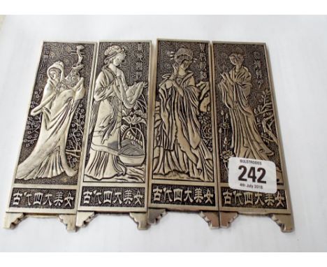 Four Chinese manuscript/scroll weights