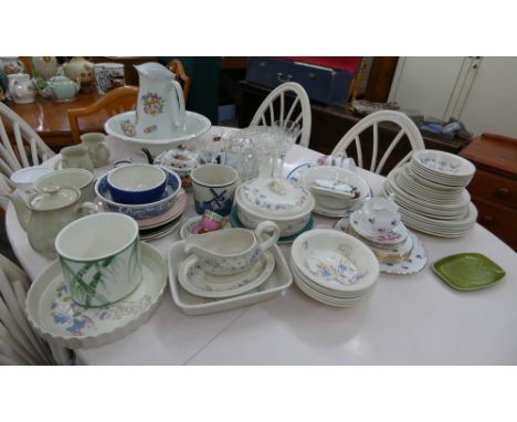 Poole Pottery floral decorated dinner ware, toilet jug and bowl, teapot, bowls and other china 