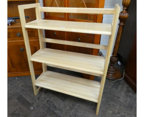 A folding light beech three tier bookshelf 2'6 wide 