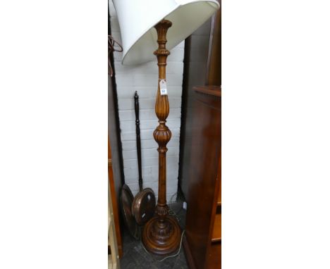 A mahogany standard lamp with reeded column and cream shade 