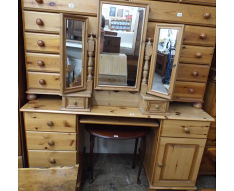 A modern pine kneehole dressing table with computer shelf and toilet mirror back 