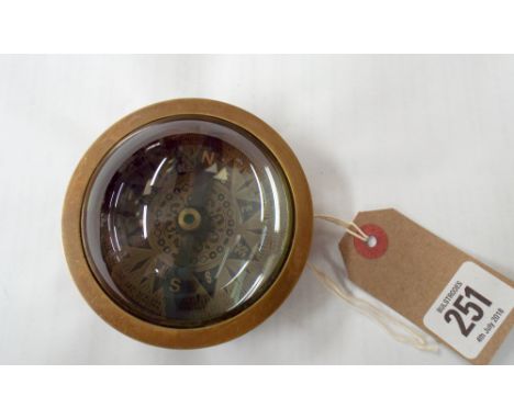 Brass navigating compass with magnifier