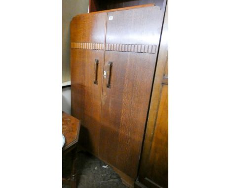 An Ercol oak two tier drop leaf tea trolley 