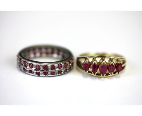 A 925 silver gilt ruby set ring and a white metal ruby set ring, (O &amp; P).