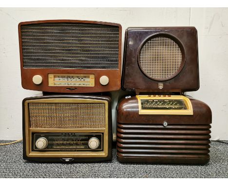 A Bush radio of model VHF-70, together with a Bakelite vintage radio and an Ekco extension speaker with a further Bakelite ra