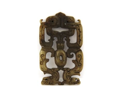 A Chinese archaic form jade dragon amulet. L. 7.4 x 4.5cm.