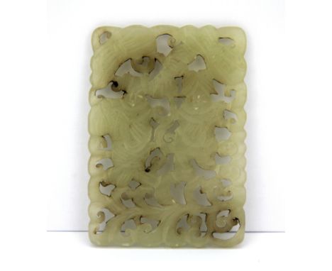 A Chinese carved celadon coloured white jade double sided panel of two children,  6 x 8 x 0.4cm.