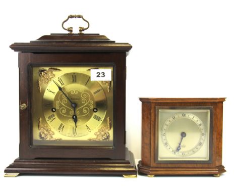 An oak cased Elliot mantel clock together with a further mahogany cased mantel clock, largest H. 30cm.