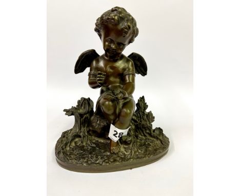 A 19th Century bronze figure of a cherub, H. 21cm.