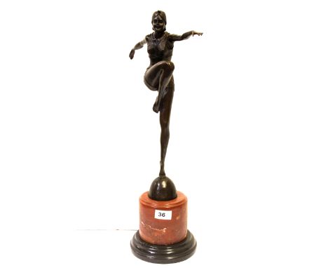 An Art Deco style bronze figure of a female dancer, after J. Philipp (1943 - 2012) on a two tone marble base, H. 56cm.
