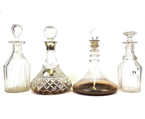A cut crystal and hallmarked silver mounted decanter with a hallmarked silver presentation label together with three Georgian