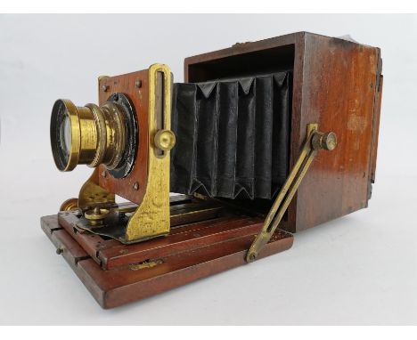 A Moore and Co unusual mahogany box bellows camera.