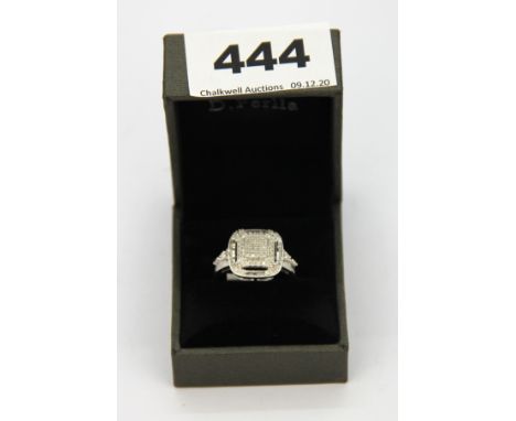 A silver ring set with 0.5ct of diamonds.
