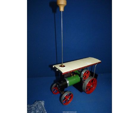 An original boxed Mamod model T.E.1, live steam Traction Engine complete with vapourising spirit lamp, filler funnel and deta