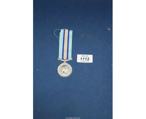 A Royal Observer Corps Medal named 82636 Chief Observer R B Angus Roc.