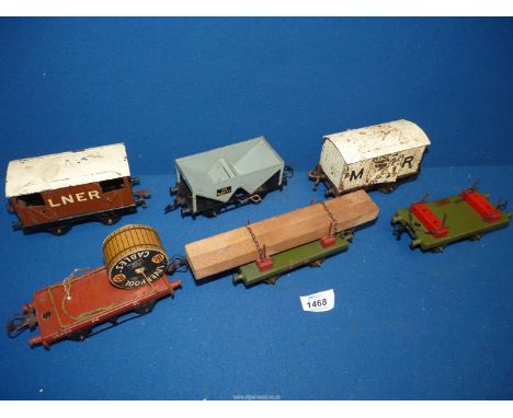 A quantity of Rolling stock 'O' gauge - white 'M R' wagon, grey sand/gravel truck no. B40177, brown LNER guards van, two gree