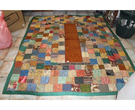 A vintage hand-made Patchwork throw 'square pattern' with central rust coloured corduroy panel, some damage, 77" x 90".