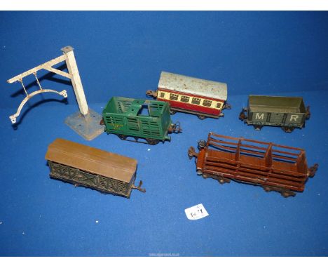 A quantity of Rolling stock 'O' gauge - maroon/cream passenger coach, grey/green cattle truck, grey/green 'M R' open truck, b