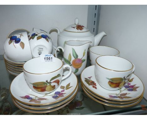 A Royal Worcester 'Evesham' six setting tea set with teapot, cups & saucers,milk jug, etc.