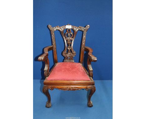 A very elegant and charming Mahogany Chippendale style miniature open armed Elbow Chair having carved and fretworked details,