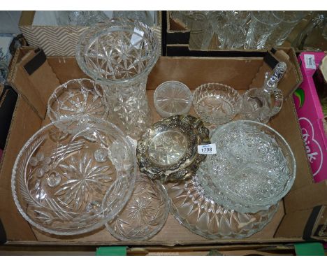 A box of cut and etched glass to include vinaigrette/water jug 8" high, footed fruit bowl 9 1/2" diameter, cake plate 11" dia