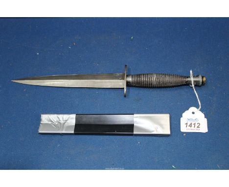 A vintage post WWII Fairburn Sykes British Commando knife;  this is the 3rd, pattern first introduced in 1943 (sheath a/f). *