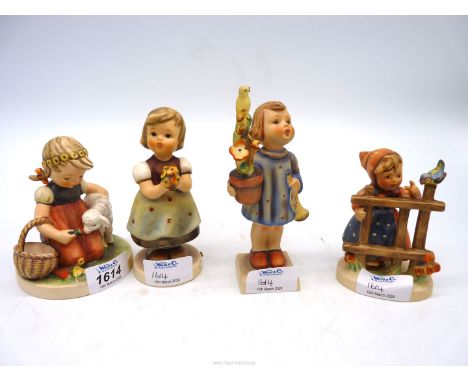 Four Hummel girl figures to include 'Favourite Pet', 'Congratulations', etc., tallest 5 1/2".
