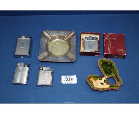 A small qty of smoking ephemera incl. boxed Ronson's lighter, ashtrays, cased Meerschaum pipe etc.