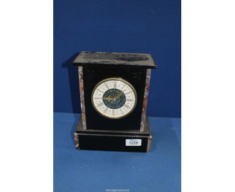 A slate Mantle clock having quartz movement by Precista, 9'' tall x 7 1/2'' wide.