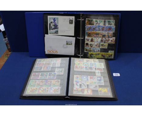 Two Stock books/albums of world and new stamps including First day covers.