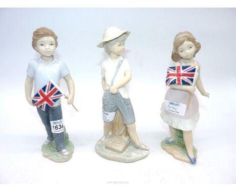 Two Lladro figures - one of Boy with Union Jack flag and the other Girl with flag, 8 1/4" tall, plus Nao figure of a Young bo