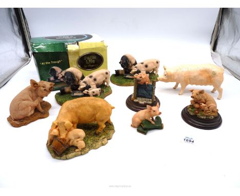 An Aynsley Mastercraft sow and piglets, "Pink piglet and wellies" by Studio, Border Fine Arts, two Farmlife pigs and piglets 