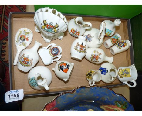 A quantity of souvenir china including; Exeter tennis racquet, Bristol clam shell, Clevedon, Marlborough, Worcester, etc.