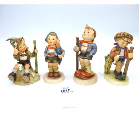 Four large Hummel boy figures to include 'Home from Market', 'Little Hiker Boy', etc., tallest 6 1/2".