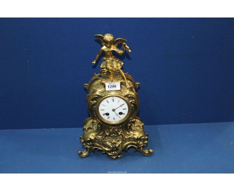 A heavy polished Brass cased Mantel/Bracket Clock having an enamelled face with Roman numerals, the two two train movement by