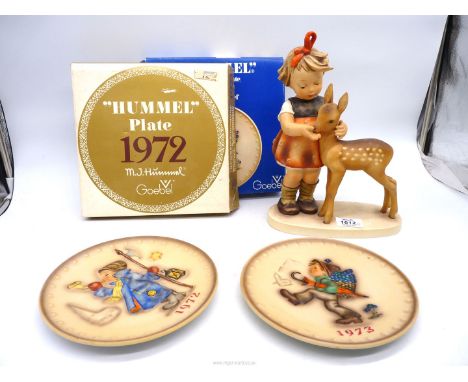 A very large Hummel figure of girl feeding a deer "Deer Friends", some crazing, 11" tall and two boxed Hummel annual 1972 and