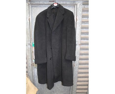 A Gents black Crombie overcoat for Austin Reed, single vent with turn back cuffs, size 44 approx.