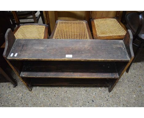 A stained pine three tier wall shelf, 80cm wide