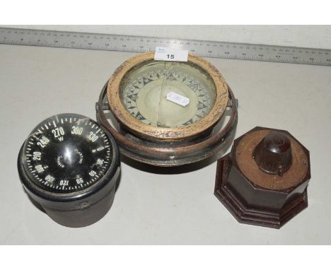 Mixed lot comprising a vintage compass marked Plastimo, France, a further Sestrel Boat Compass and a further bakelite cased g