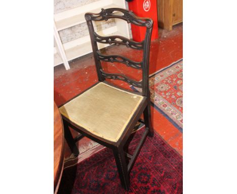 A set of eight mahogany ladder back dining chairs in George III style, late 19th/early 20th Century to include two armchairs 