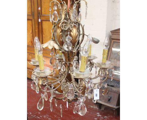 A French gilt metal and glass hung six light chandelier, 20th Century