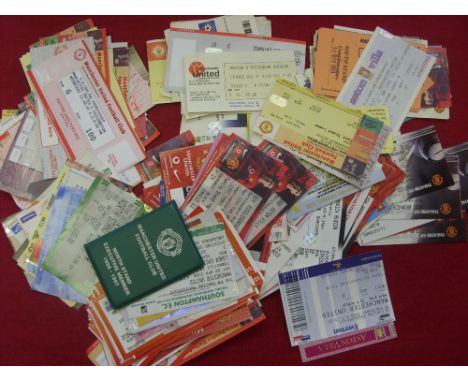 A collection of approximately 250 Manchester United home and away tickets  from the mid 1980s to 2007 plus season ticket book