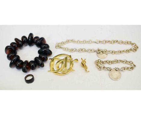 Collection of designer costume jewellery, including a Christian Dior brooch, Yves St Laurent pin, 'Tiffany &amp; Co' silver n