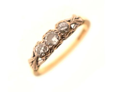 Diamond three-stone 18ct gold ring, the graduated brilliant cut diamonds illusion set in white gold, size K, Birmingam 1961, 