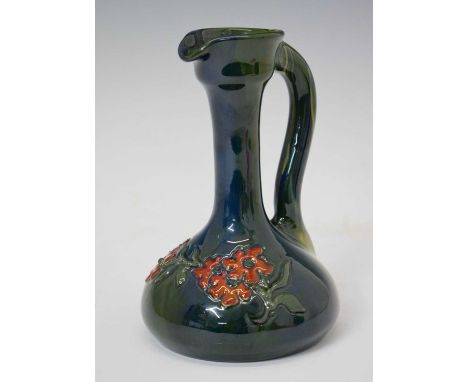Elton Ware (Clevedon) pottery jug, compressed ovoid form with attenuated neck, decorated with flowering foliage on a streaked