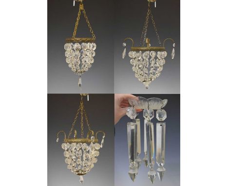 Pair of early 20th century gilt metal and faceted bead bag light fittings with ceiling rose, another smaller, glass lustres, 